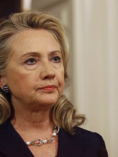 Hillary Clinton looks focused and thoughtful during a public event, HD Mobile Wallpaper