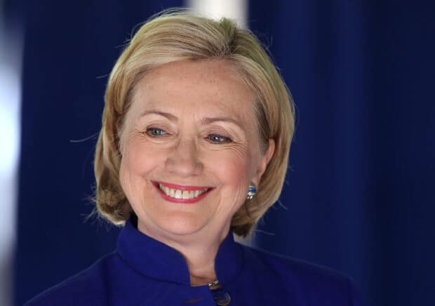 Hillary Clinton is smiling warmly in a close up portrait, 2K Desktop Wallpaper