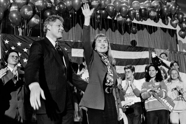 Hillary Clinton waves to crowd at a political rally with Bill Clinton and supporters, HD Desktop Wallpaper