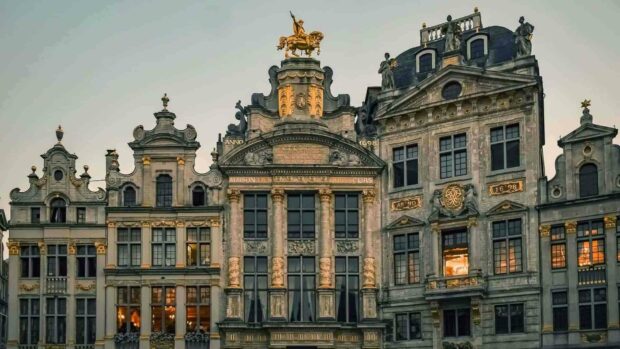 The historic architecture in Brussels city center features ornate buildings with gold accents, HD Desktop Wallpaper