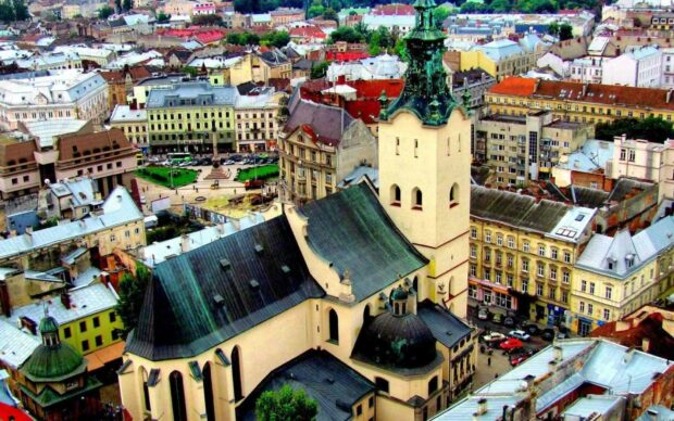 A historic cityscape featuring unique architecture and rooftops in Ukraine, HD Desktop Wallpaper