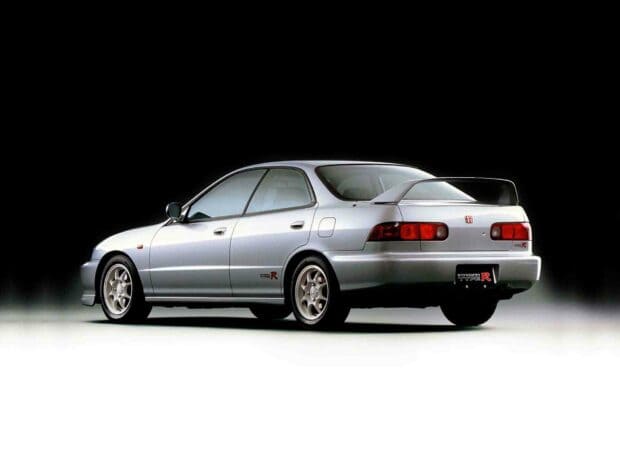A silver Honda Integra Type R is shown from the side on a black and white gradient background, HD Desktop Wallpaper