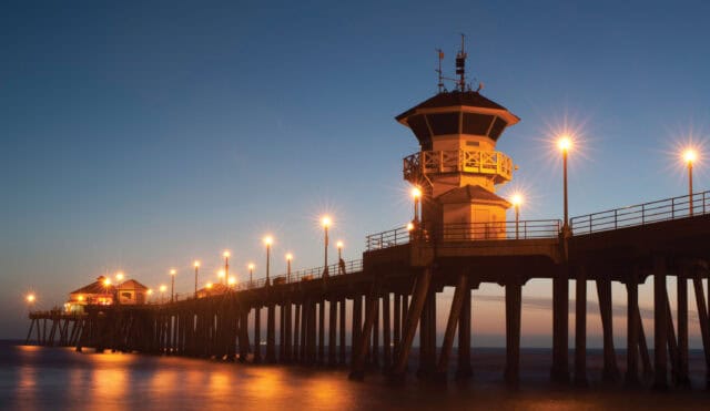 Huntington Beach Pier Sunset Lights Calm Ocean Wallpaper Background