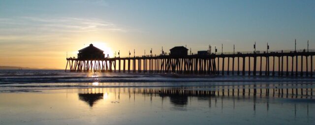 Huntington Beach Pier Sunset Reflection Wallpaper for Relaxing Coastal Views