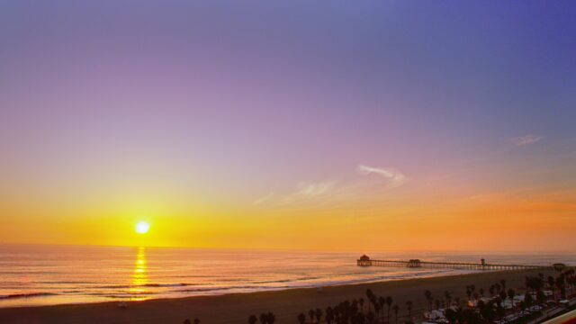 Huntington Beach Sunset Over Ocean Pier Stunning Coastal Wallpaper