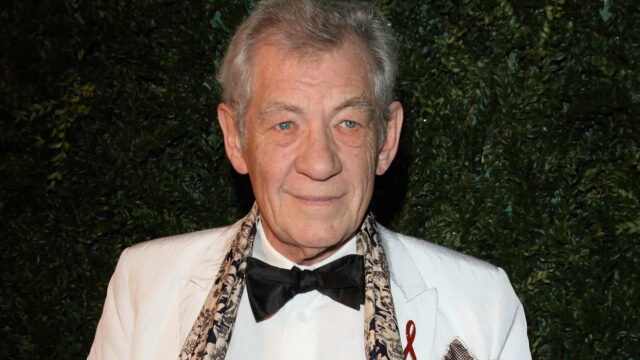 Ian McKellen Elegant White Suit Portrait Wallpaper For Fans And Enthusiasts