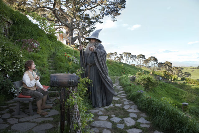 Ian McKellen As Gandalf In Scenic Hobbiton Setting For Wallpapers