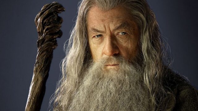 Ian McKellen As Gandalf With Detailed Staff And Long White Beard Wallpaper