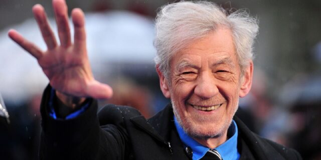 Ian McKellen Smiling And Waving Close Up Portrait Wallpaper