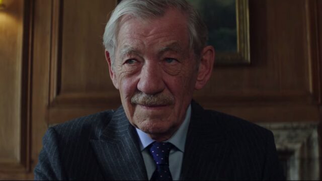 Ian Mckellen Close Up Portrait In Classic Suit Professional Wallpaper