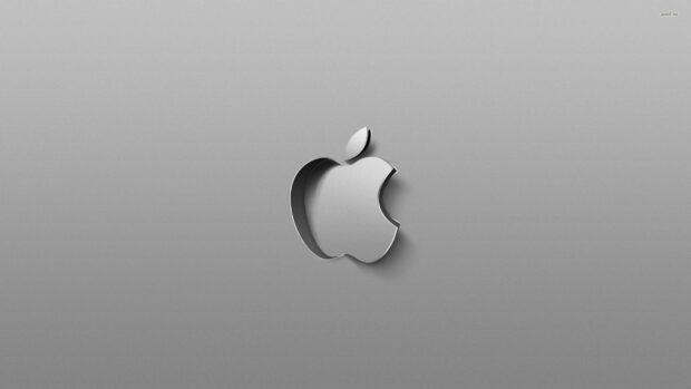 A metallic Imac logo with a three dimensional effect on a gray background, 2K Desktop Wallpaper