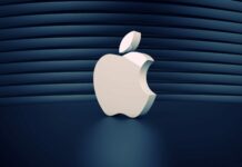 A 3D silver Imac logo stands out against a dark blue curved background, HD Desktop Wallpaper