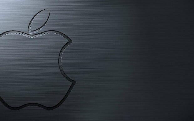 The image shows an Imac logo with a smooth metallic texture on a dark brushed metal background, 2K Desktop Wallpaper