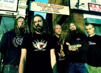 In Flames Band Members Group Photo Urban Scene Wallpaper
