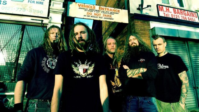 In Flames Band Members Group Photo Urban Scene Wallpaper