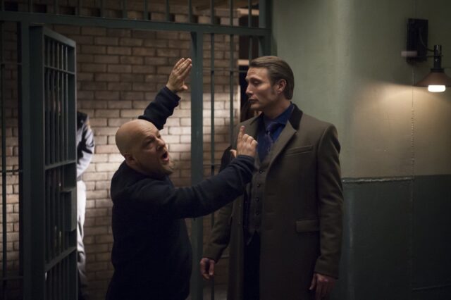 Intense Scene From Mads Mikkelsen Movie Set Wallpaper