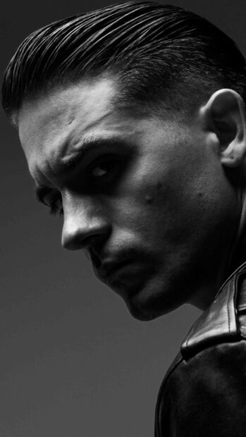 The intense portrait of G Eazy shows him looking sideways with a focused expression, G Eazy Wallpapers, 4K Mobile Wallpaper
