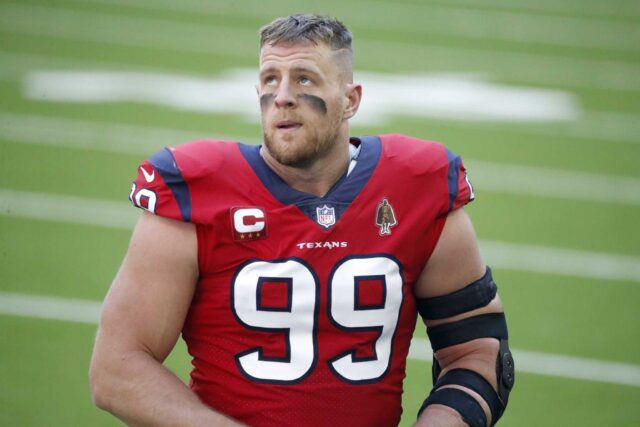 JJ Watt Focused In Red Jersey NFL Wallpaper