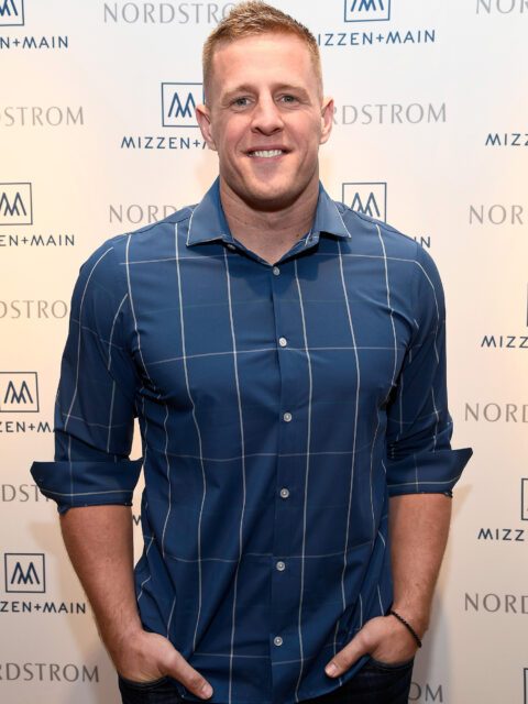 JJ Watt Smiling In Stylish Blue Shirt Wallpaper