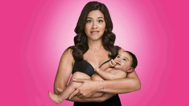 A woman holds a baby while making a surprised face in this Jane The Virgin wallpaper, HD Desktop Wallpaper