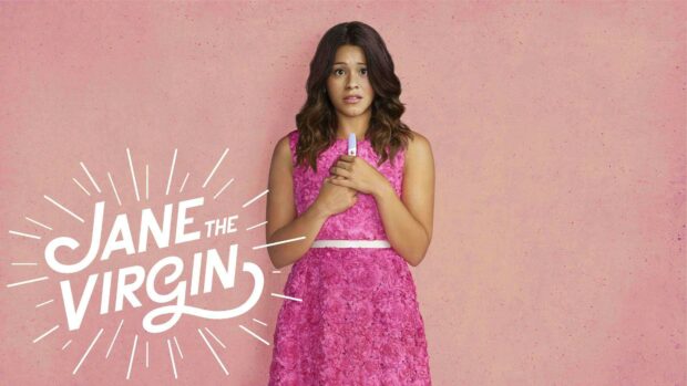 A woman in a floral pink dress holding a pregnancy test with a worried expression representing Jane The Virgin Wallpapers, 4K Desktop Wallpaper