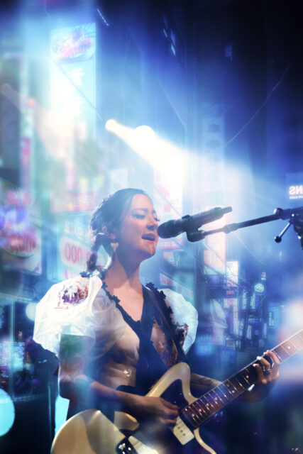 Japanese Breakfast Live Performance Night Lights Wallpaper