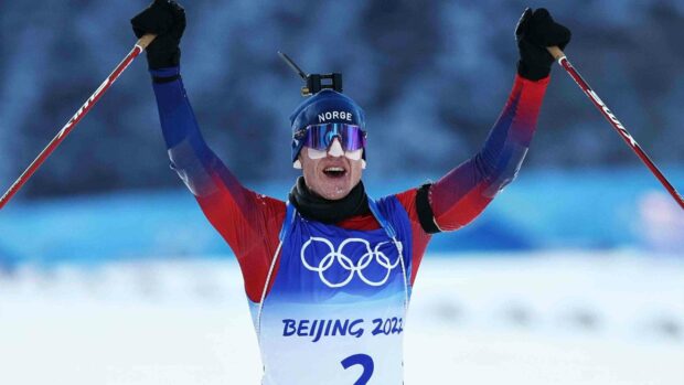 Johannes Thingnes is seen celebrating during a cross country skiing event at the Beijing Winter Olympics, 2K Desktop Wallpaper