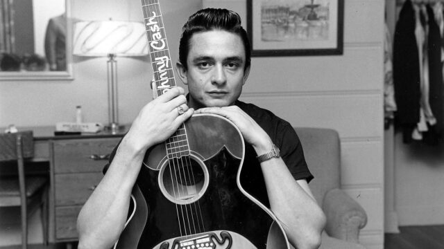 Johnny Cash Classic Guitar Portrait Wallpaper