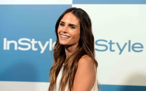 Jordana Brewster is smiling confidently with long hair at a media event, 2K Desktop Wallpaper