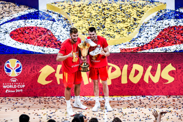 Juancho Hernangomez Celebrates FIBA Basketball World Cup 2019 Victory With Trophy And Teammate