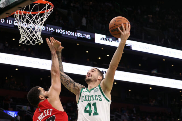 Juancho Hernangomez Celtics Action Wallpaper Driving To The Basket Against Defender