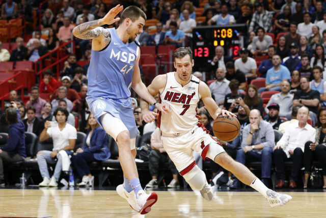 Juancho Hernangomez Defending Miami Heat Player During Intense NBA Game Action