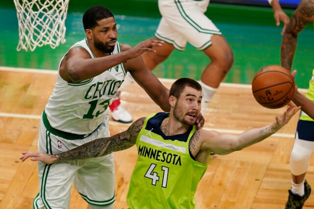 Juancho Hernangomez In Action Defending Against Boston Celtics Player During NBA Game Wallpapers