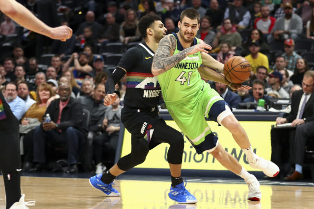 Juancho Hernangomez In Action Driving Past Defender Minnesota Timberwolves Wallpaper