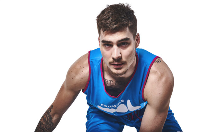 Juancho Hernangomez In Blue Basketball Jersey Focused Pose Wallpaper