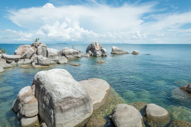 Lake Malawi Tranquil Waters And Rocks Wallpaper