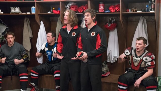 Letterkenny TV Series Hockey Team In Locker Room Intense Moment Wallpaper