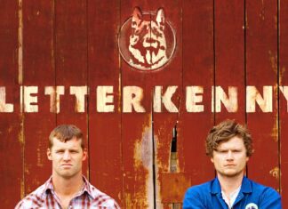 Letterkenny TV Series Wallpaper Featuring Main Characters In Front Of Rustic Barn Background