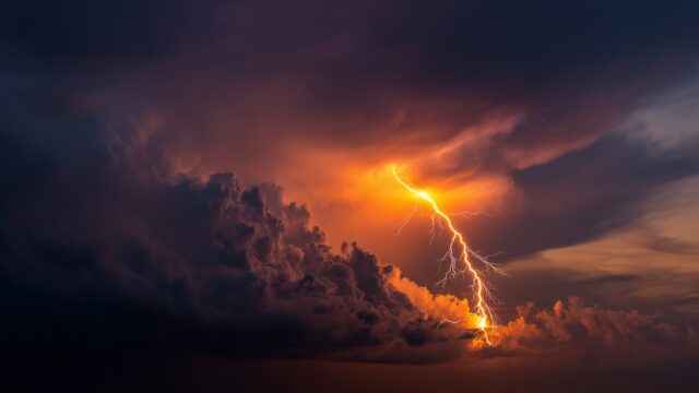 Lightning HD Wallpaper For Desktop, A Striking Bolt Of Lightning Illuminating A Dark Stormy Sky, Vivid Colors Bursting Through The Clouds