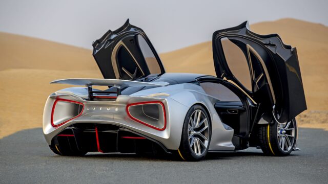 Lotus Evija Supercar Rear View With Open Doors In Desert Perfect Wallpaper Background