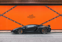 Luxury Car In Front Of Hermes Paris Orange Wall
