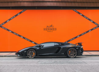 Luxury Car In Front Of Hermes Paris Orange Wall