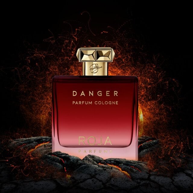 Luxury Roja Dove Perfume Bottle With Fiery Design Background