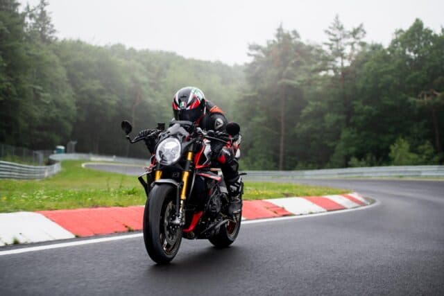 MV Agusta Brutale 1000 Motorcycle Racing on Wet Curved Track Wallpaper