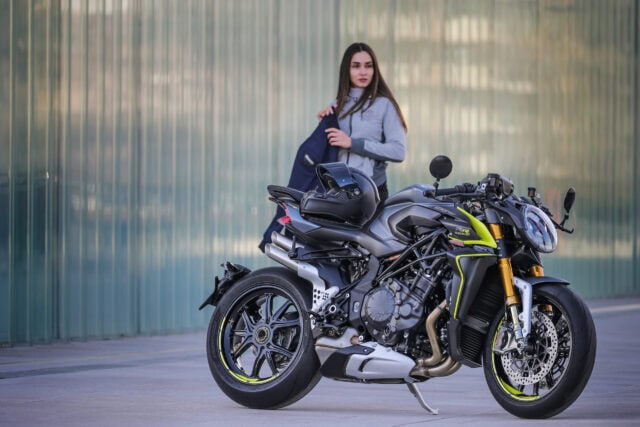 MV Agusta Brutale 1000 Motorcycle with Helmet and Rider in Urban Setting Wallpapers