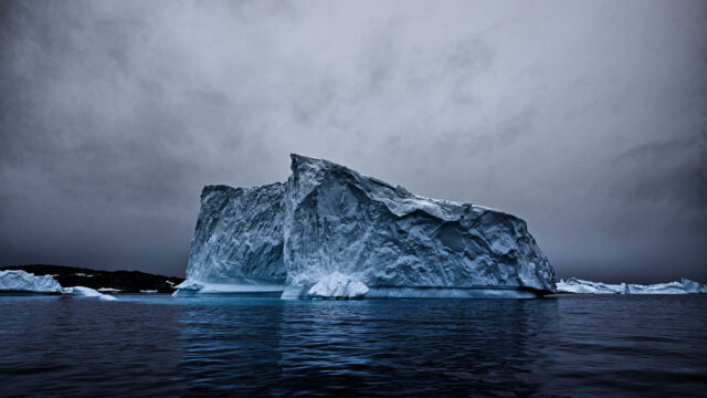 Majestic Iceberg Floating In Arctic Ocean Under Moody Sky Arctic Ocean Wallpapers