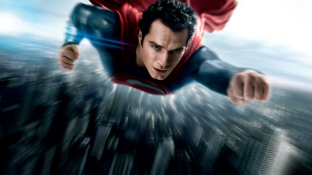 Man Of Steel Flying Through The City Wallpaper
