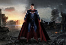 Man Of Steel Standing Strong Amidst Destruction Wallpaper
