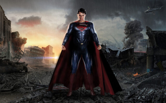 Man Of Steel Standing Strong Amidst Destruction Wallpaper