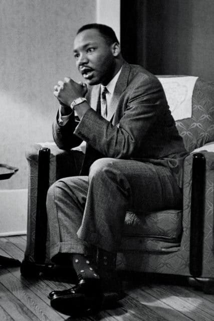 Martin Luther King Jr. In Thoughtful Moment Wallpaper